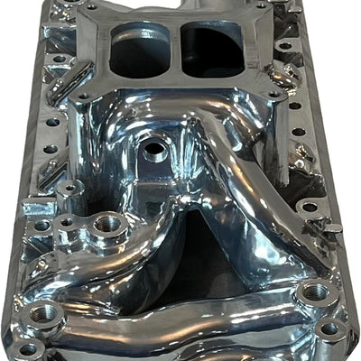 Metallic engine block on a white background