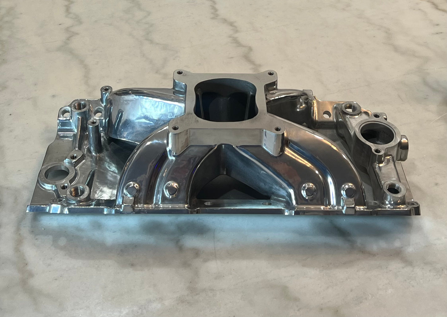 Polished Aluminum Intake Manifold for Big Block Chevy, Oval Port, Single Plane, Air Gap Style.