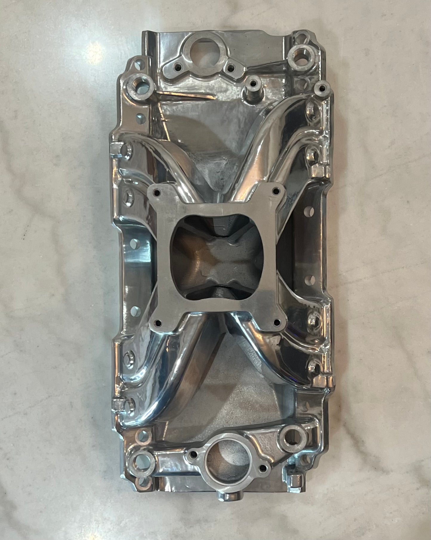 Polished Aluminum Intake Manifold for Big Block Chevy, Oval Port, Single Plane, Air Gap Style.